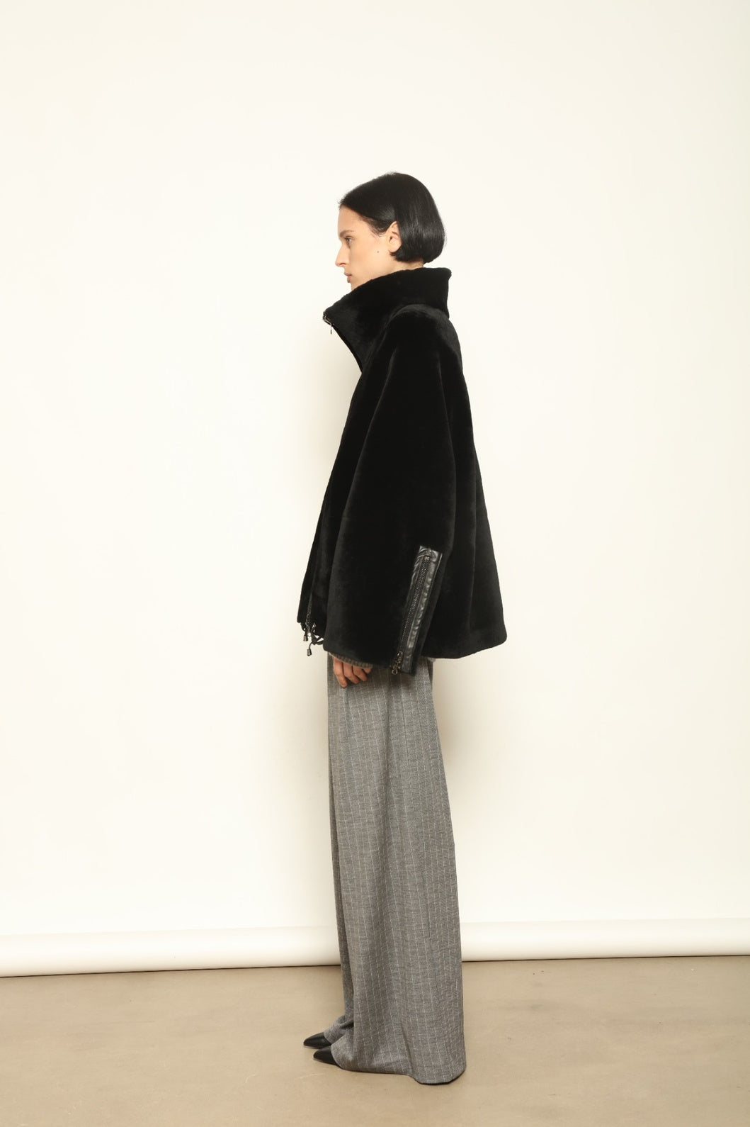 Colette Sud Africa Ironed Black Nappa Jacket by Novelle – reversible Italian shearling and nappa leather jacket in polished black, handcrafted for timeless elegance at House of Woven Stories.