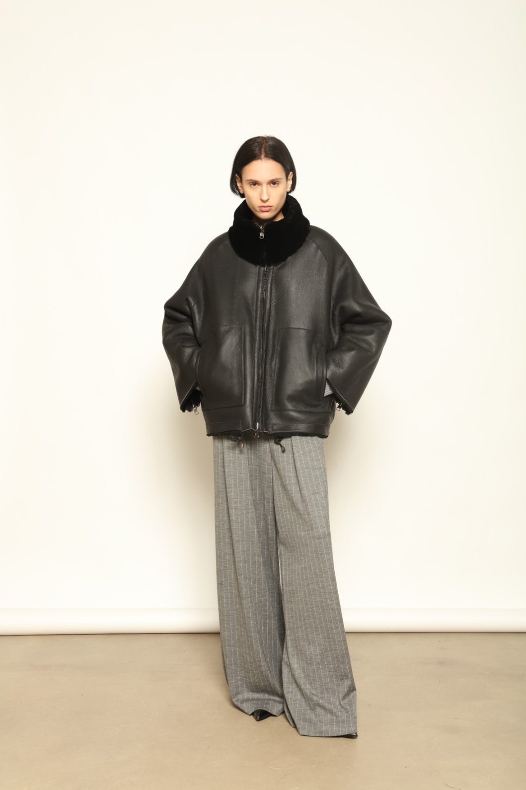 Colette Sud Africa Ironed Black Nappa Jacket by Novelle – reversible Italian shearling and nappa leather jacket in polished black, handcrafted for timeless elegance at House of Woven Stories.