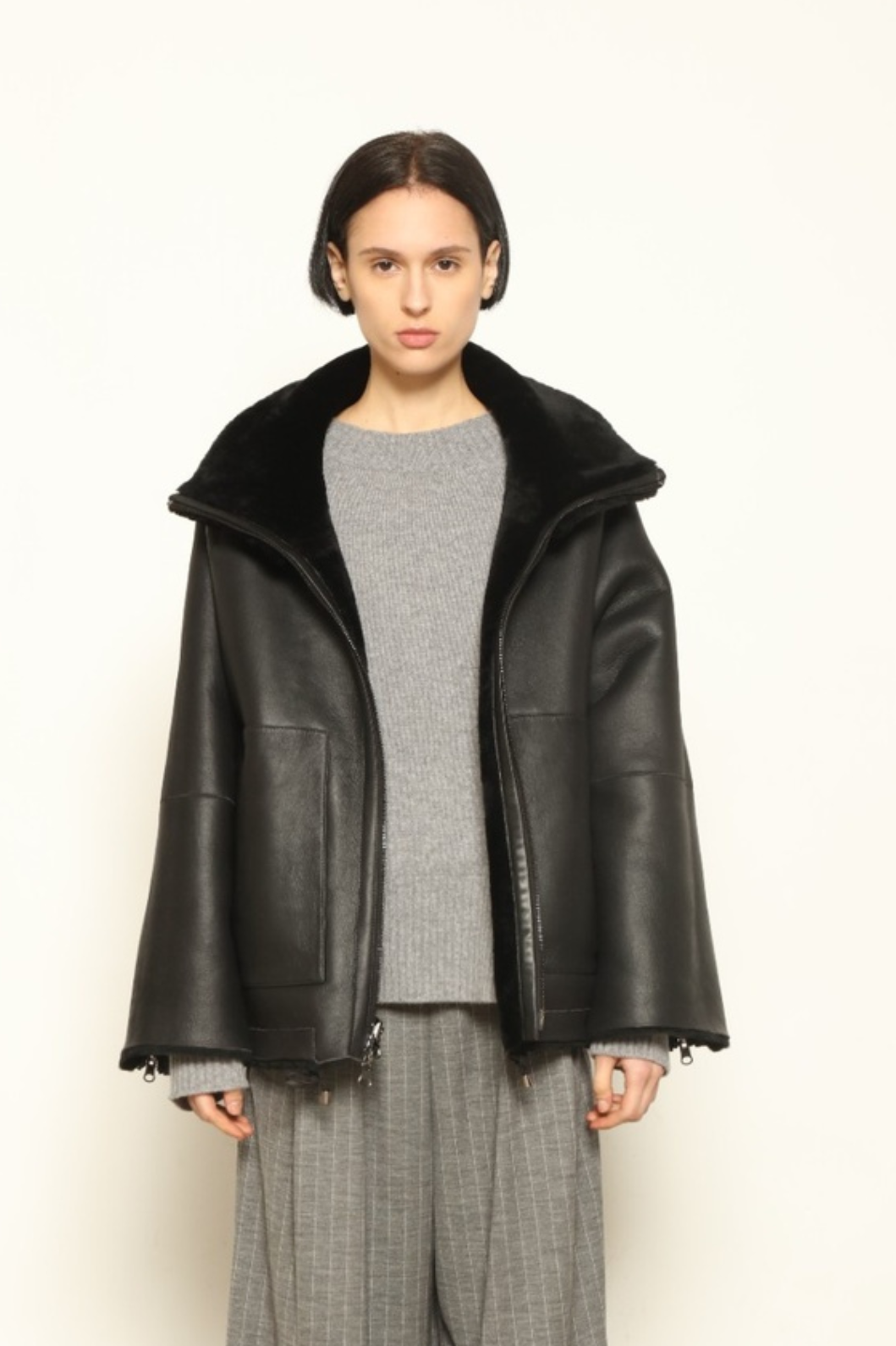 Colette Sud Africa Ironed Black Nappa Jacket by Novelle – reversible Italian shearling and nappa leather jacket in polished black, handcrafted for timeless elegance at House of Woven Stories.