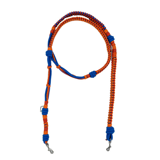 Close-up of MY BOB macramé dog leash, handmade in Italy with colorful braided design and sturdy hardware, shown attached to a harness.