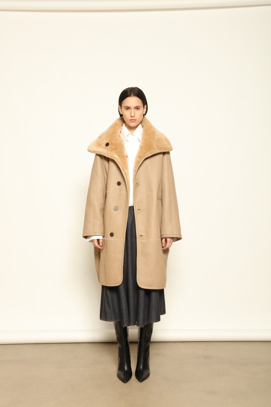 Giselle Camel Long Silky Peach Jacket by Novelle – handcrafted reversible Italian coat in nappa leather and shearling, photographed in soft natural light for House of Woven Stories.