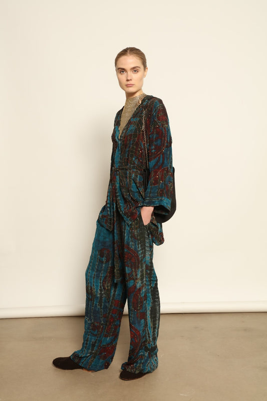 Model is wearing the Gorana Cobalt Timber Kimono Suit by House of Woven Stories, crafted from 100% pure silk with re-wearable sari fabric, featuring a relaxed kimono silhouette and intricate patterns for timeless elegance.