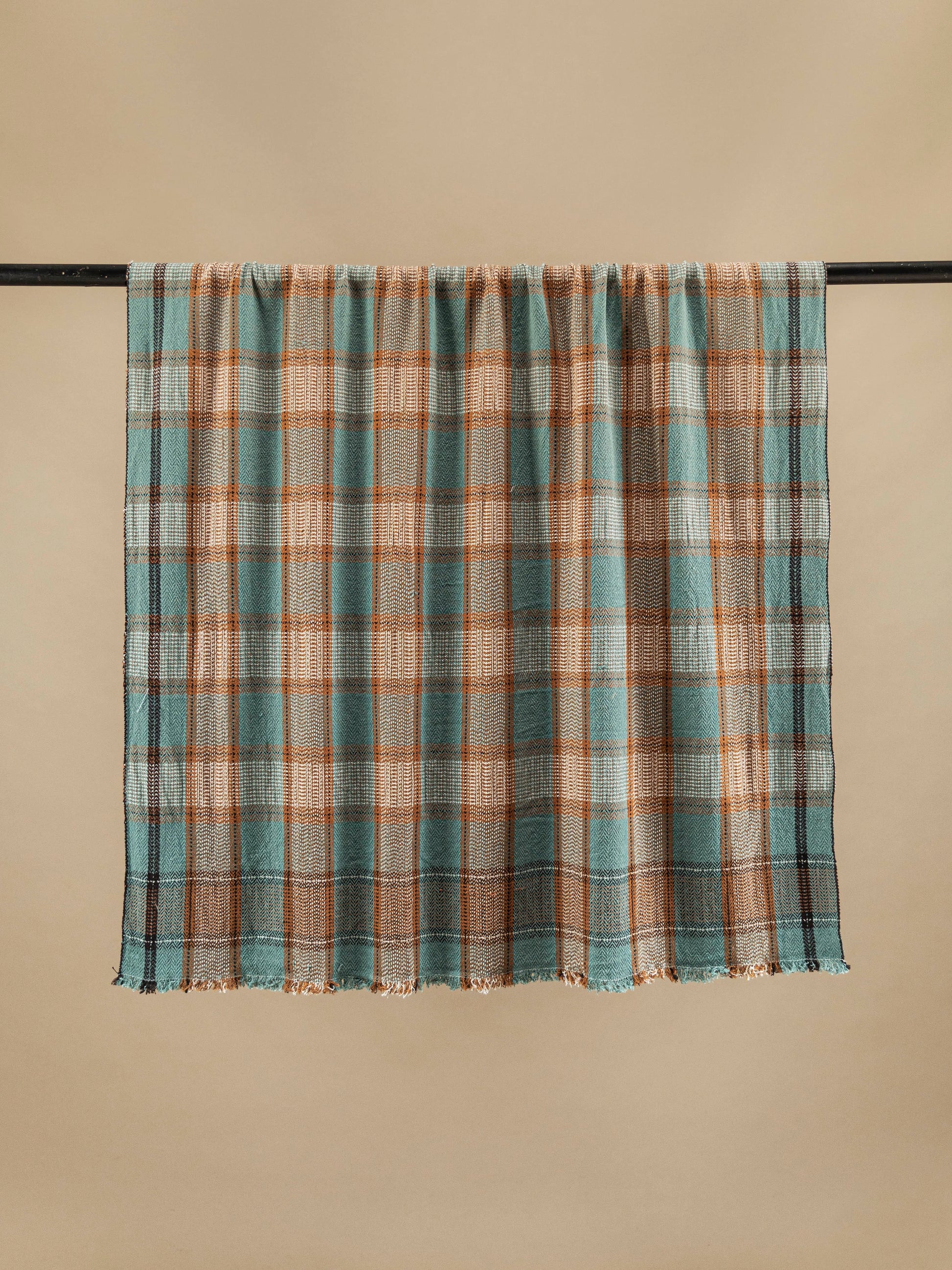 Handmade cotton plaid N°26 in warm Wood by Moismont, 100% pure cotton, soft and durable, perfect for cozy living room or bedroom decor. Available at House of Woven Stories.