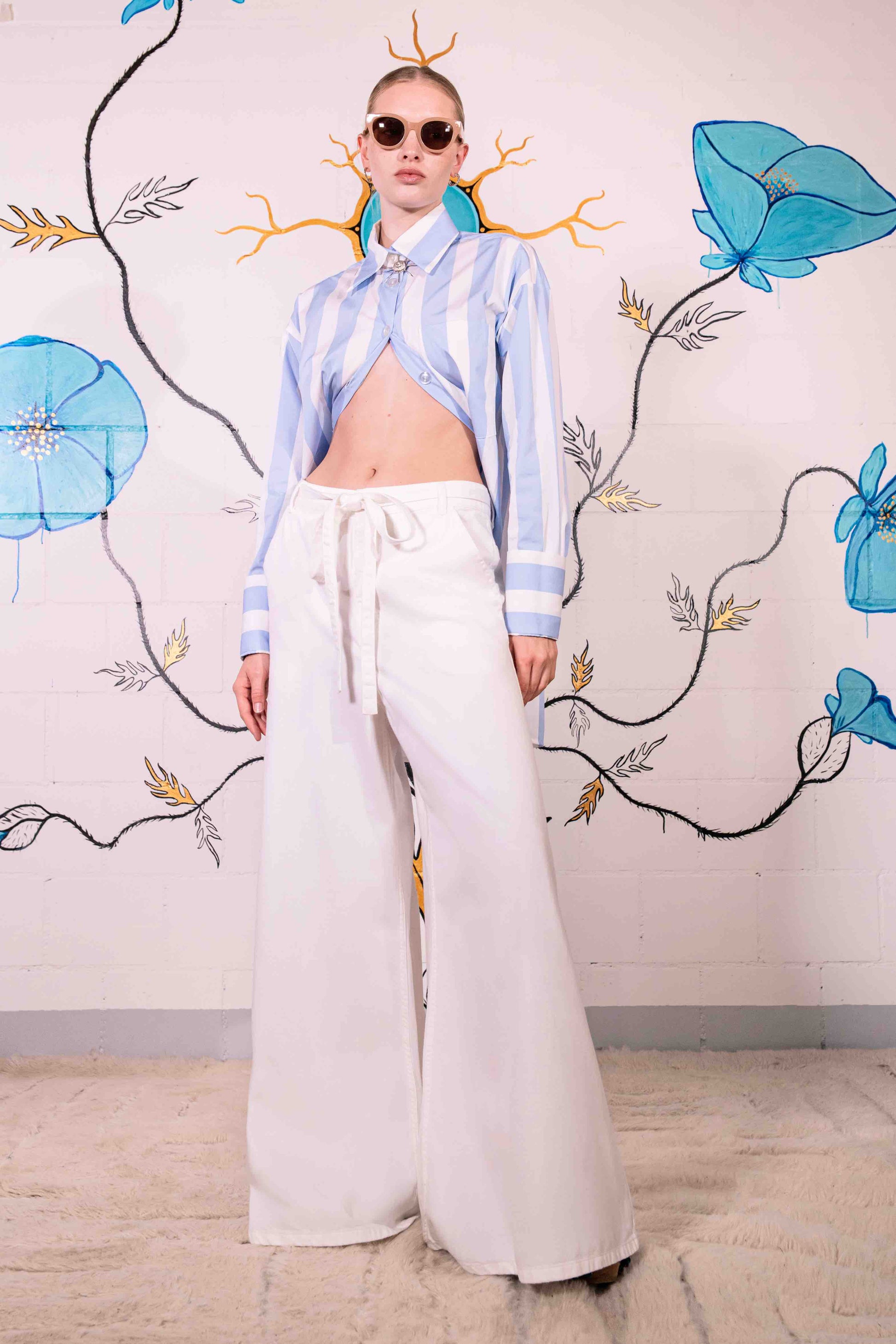 Relaxed flared fit jeans from Happy Haus crafted in Italy from 100% DETOX-certified cotton. Part of the House of Woven Stories selection for timeless, sustainable style.