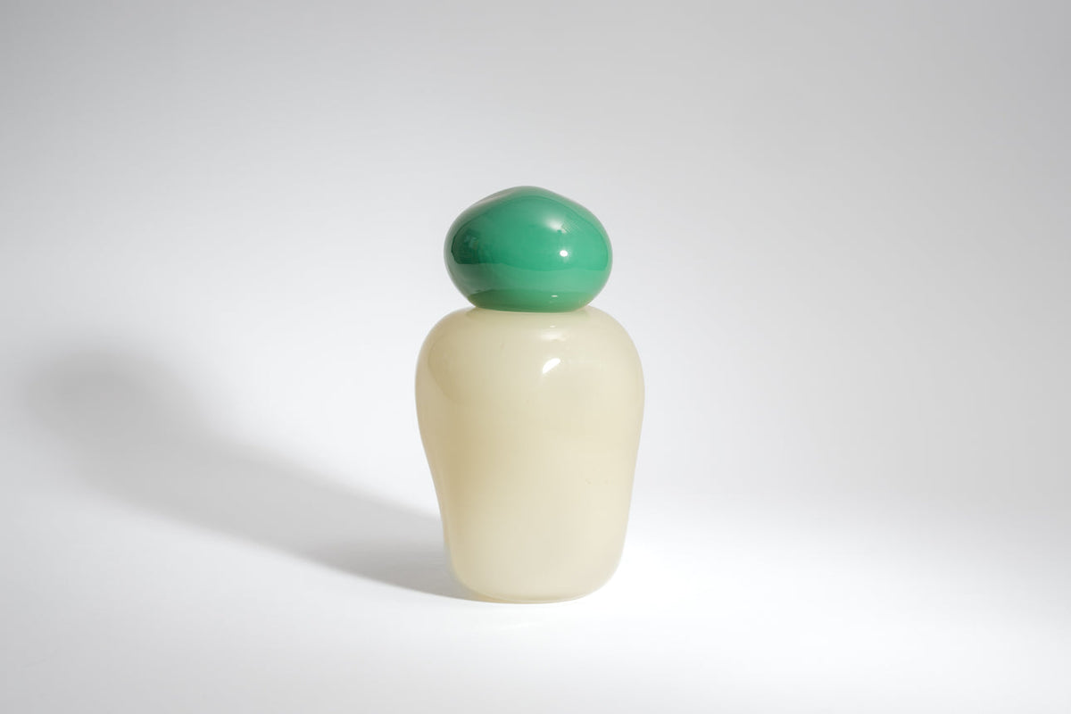 Bon Bon Medi by Helle Mardahl Studio in Spearmint and Champagne, handmade sculptural glass vase with removable lid, available at House of Nomad Stories.