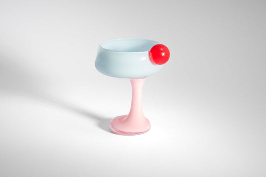 The Signature Glass with a Twist by Helle Mardahl Studio in Grapefruit, Blue Jelly and Milky Rose, handmade twisted glass drinking vessel from House of Nomad Stories.