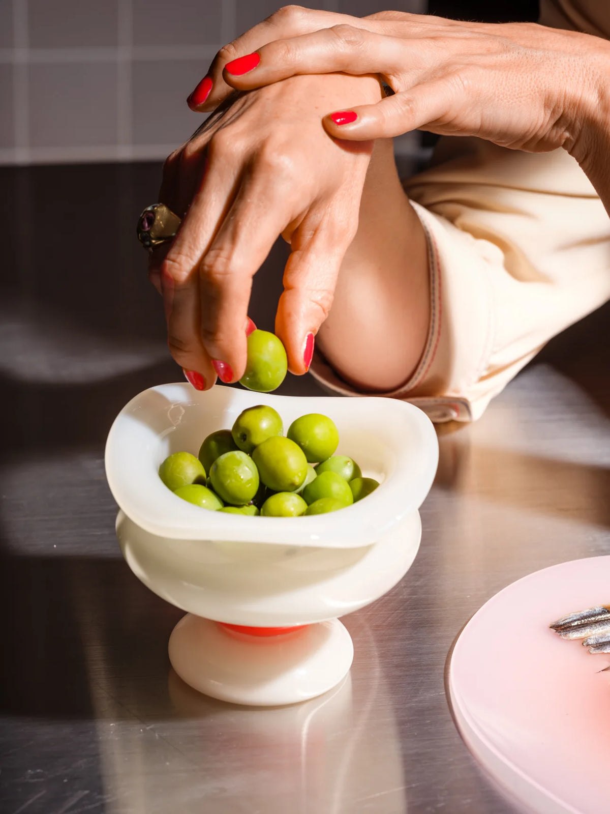 The Basin by Helle Mardahl Studio in Apricot, Mint and Coconut, handmade sculptural glass bowl with organic curves and glossy finish from House of Nomad Stories.