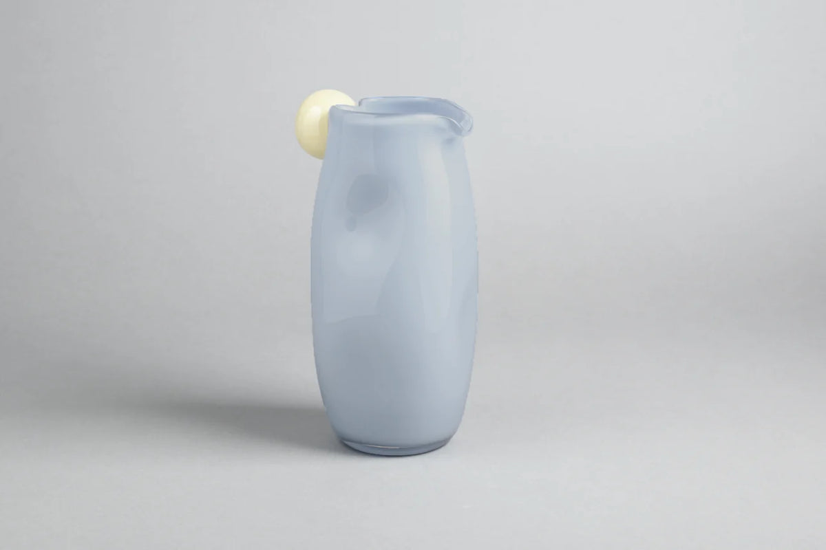 The Jug with a Twist by Helle Mardahl Studio in Caramel Apple and Blueberry Ice Cream, 1L handmade glass jug with a slender twisted silhouette from House of Nomad Stories.
