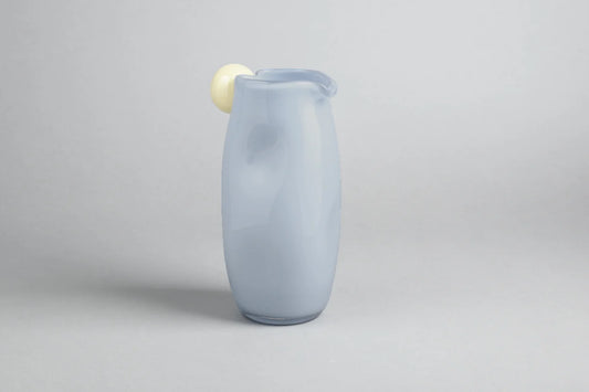 The Jug with a Twist by Helle Mardahl Studio in Caramel Apple and Blueberry Ice Cream, 1L handmade glass jug with a slender twisted silhouette from House of Nomad Stories.