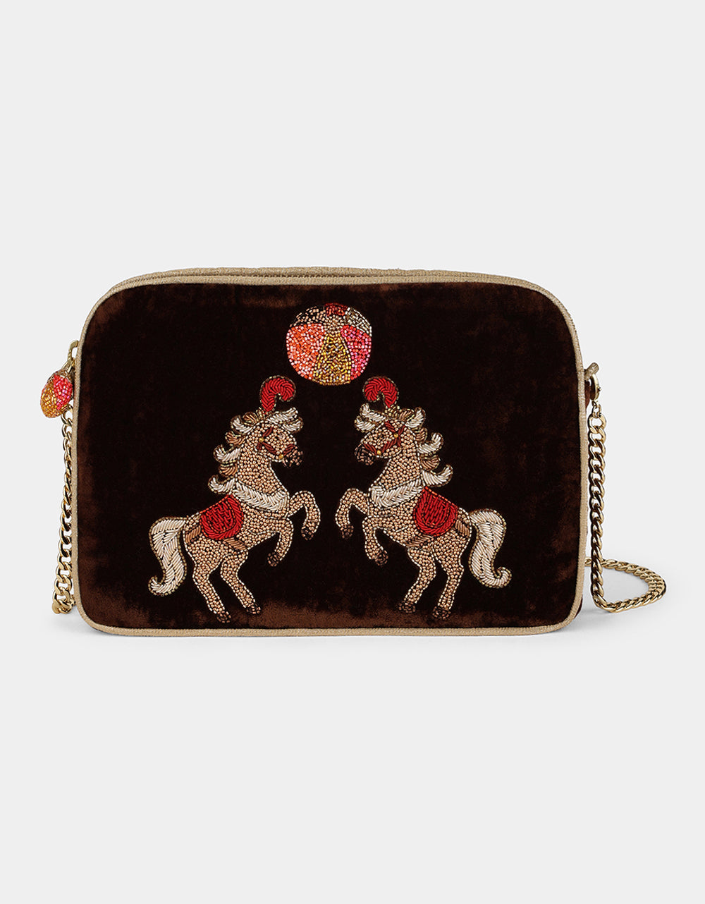 Olivia Dar Horse Brown Velvet Sling Bag by House of Woven Stories, featuring two rearing horses hand-embroidered with beads and threads in red, gold and white, with a removable chain strap for shoulder or crossbody wear.
