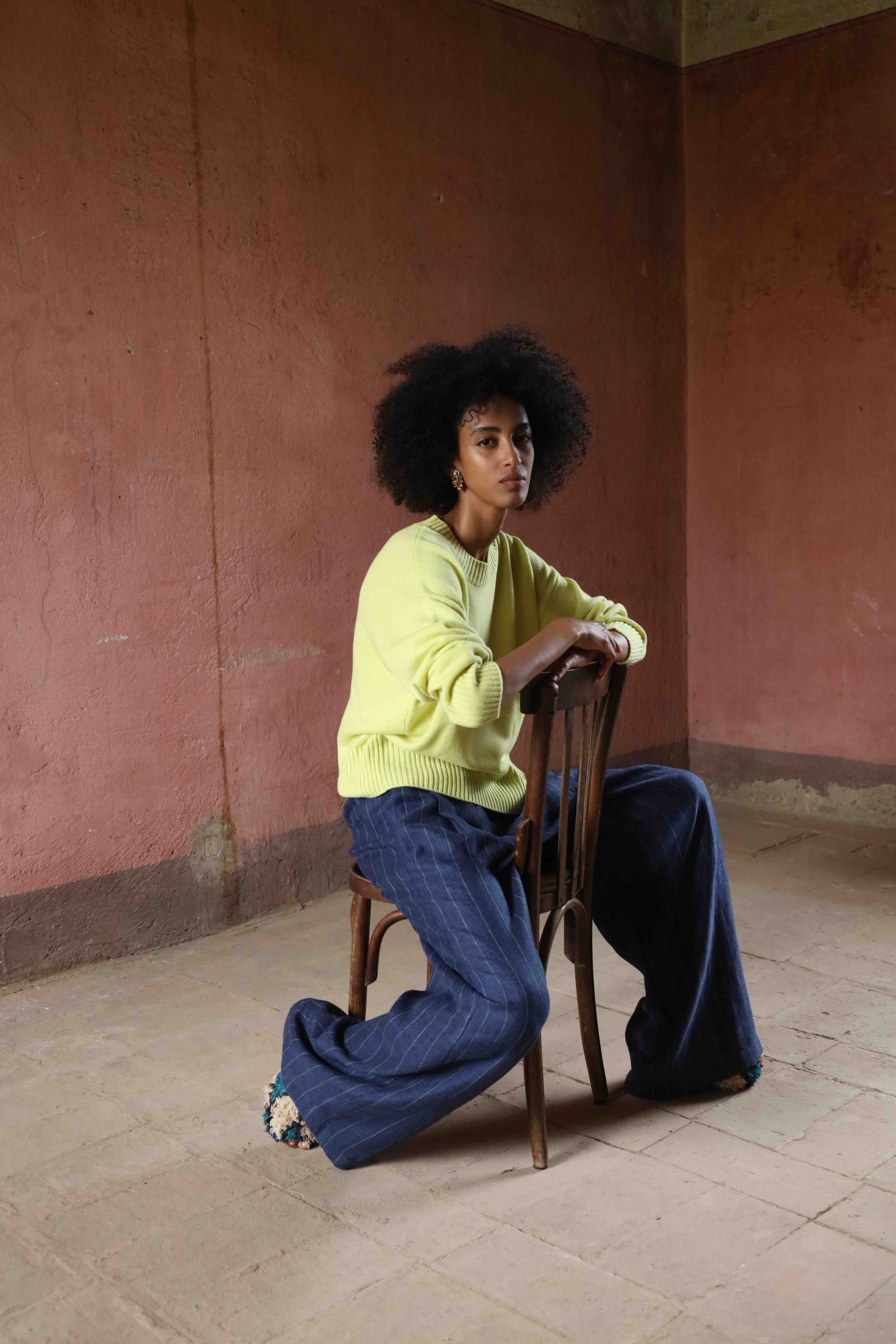 Nena Round Neck Sweater by House of Woven Stories 100% pure, undyed Inner Mongolian cashmere. Soft, breathable, handcrafted in natural tones. Relaxed fit with ribbed trims. Sustainable luxury knitwear.