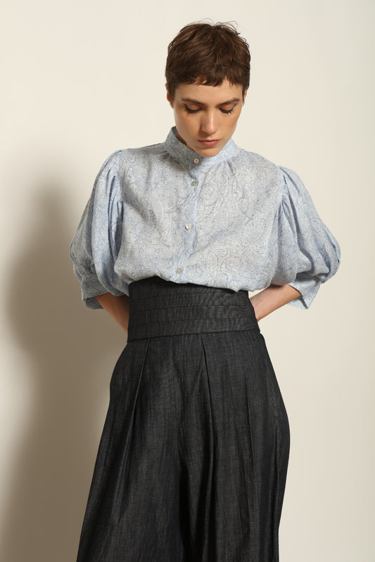 Model wearing the Sergey Night Blue Cummerbund by House of Woven Stories, featuring a structured silk-wool blend, deep night blue tone, and sculptural waist-defining silhouette.