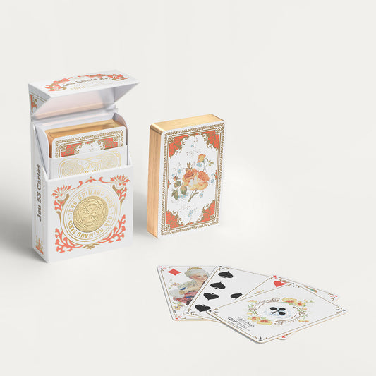 Jeu Louis XV 1504 by Grimaud Paris from the House of Woven Stories selection, luxury Bridge and Poker playing cards in Coral Red, made in France with archival illustrations and gilt edges.
