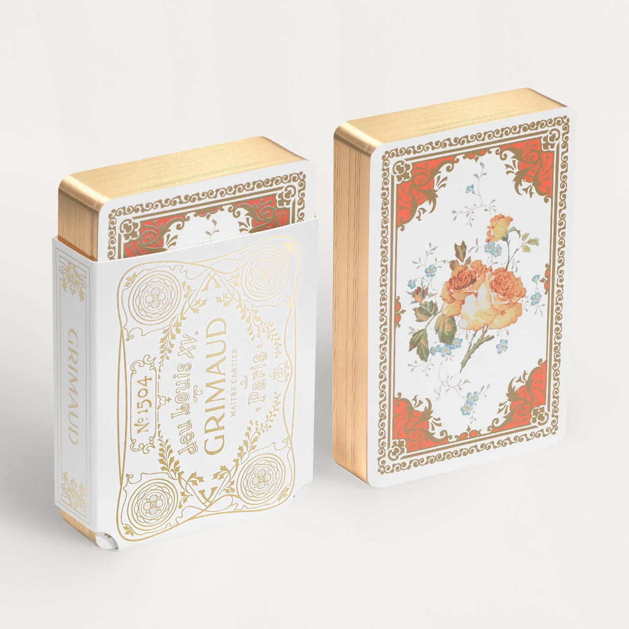Jeu Louis XV 1504 by Grimaud Paris from the House of Woven Stories selection, luxury Bridge and Poker playing cards in Coral Red, made in France with archival illustrations and gilt edges.