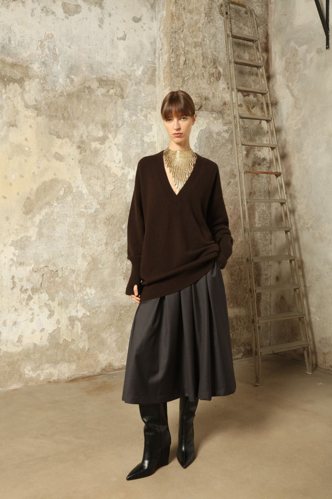 Larissa Super 100% Merino Wool Skirt by House of Woven Stories – midi-length pleated skirt in soft, luxurious merino wool, tailored in Piemonte, Italy for timeless elegance and comfort.