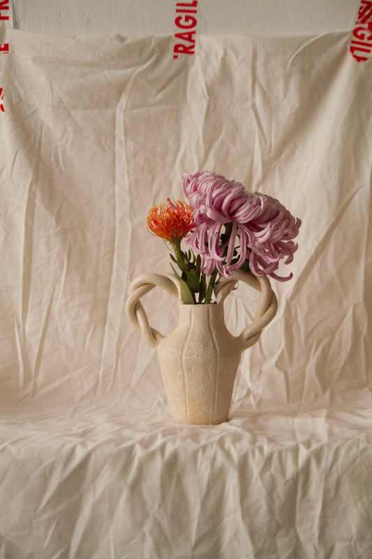 Le Petit Tressé by Clandestine Céramique, handmade in natural chamotte clay with twisted handles and engraved vertical stripes, part of the House of Woven Stories selection.