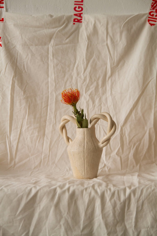 Le Petit Tressé by Clandestine Céramique, handmade in natural chamotte clay with twisted handles and engraved vertical stripes, part of the House of Woven Stories selection.