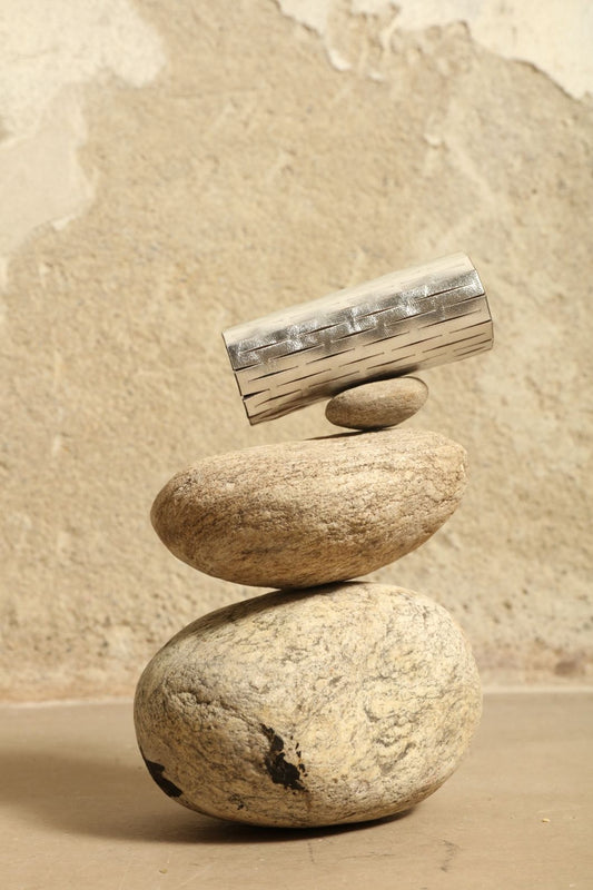 Leila Silver Bangle by SO-LE STUDIO, part of the curated selection at House of Woven Stories, handcrafted in Italy from upcycled Ferragamo leather with a mirrored silver finish, sculptural silhouette, and minimalist sustainable design.