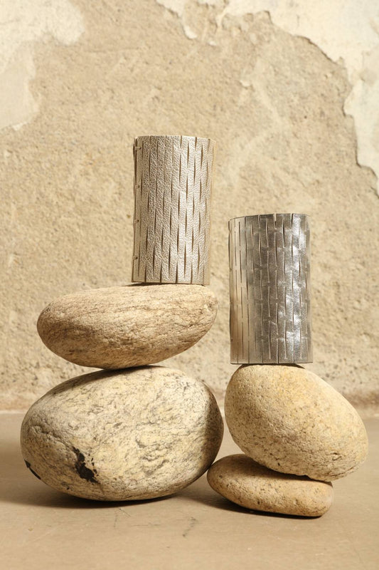 Leila Silver Bangle by SO-LE STUDIO, part of the curated selection at House of Woven Stories, handcrafted in Italy from upcycled Ferragamo leather with a mirrored silver finish, sculptural silhouette, and minimalist sustainable design.