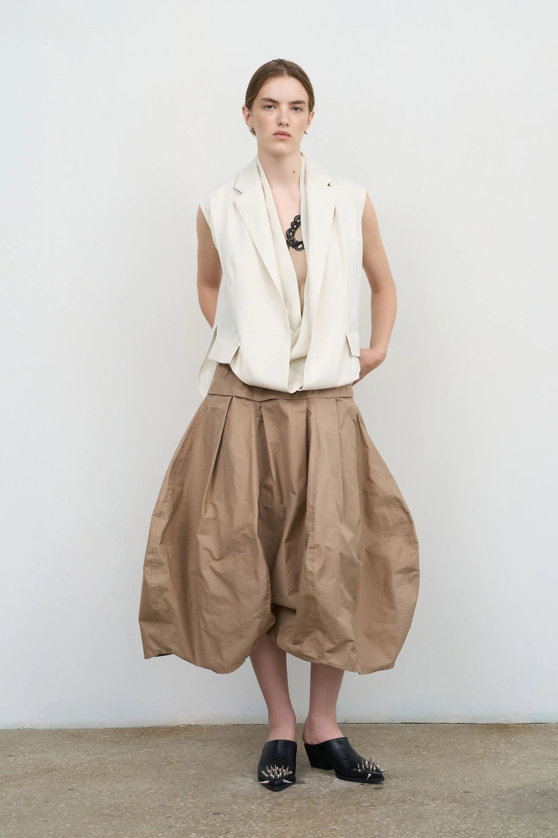 Layered Tucked Hem Vest by Litkovska, contemporary tailored vest with sculptural layered hem, relaxed fit and architectural silhouette.