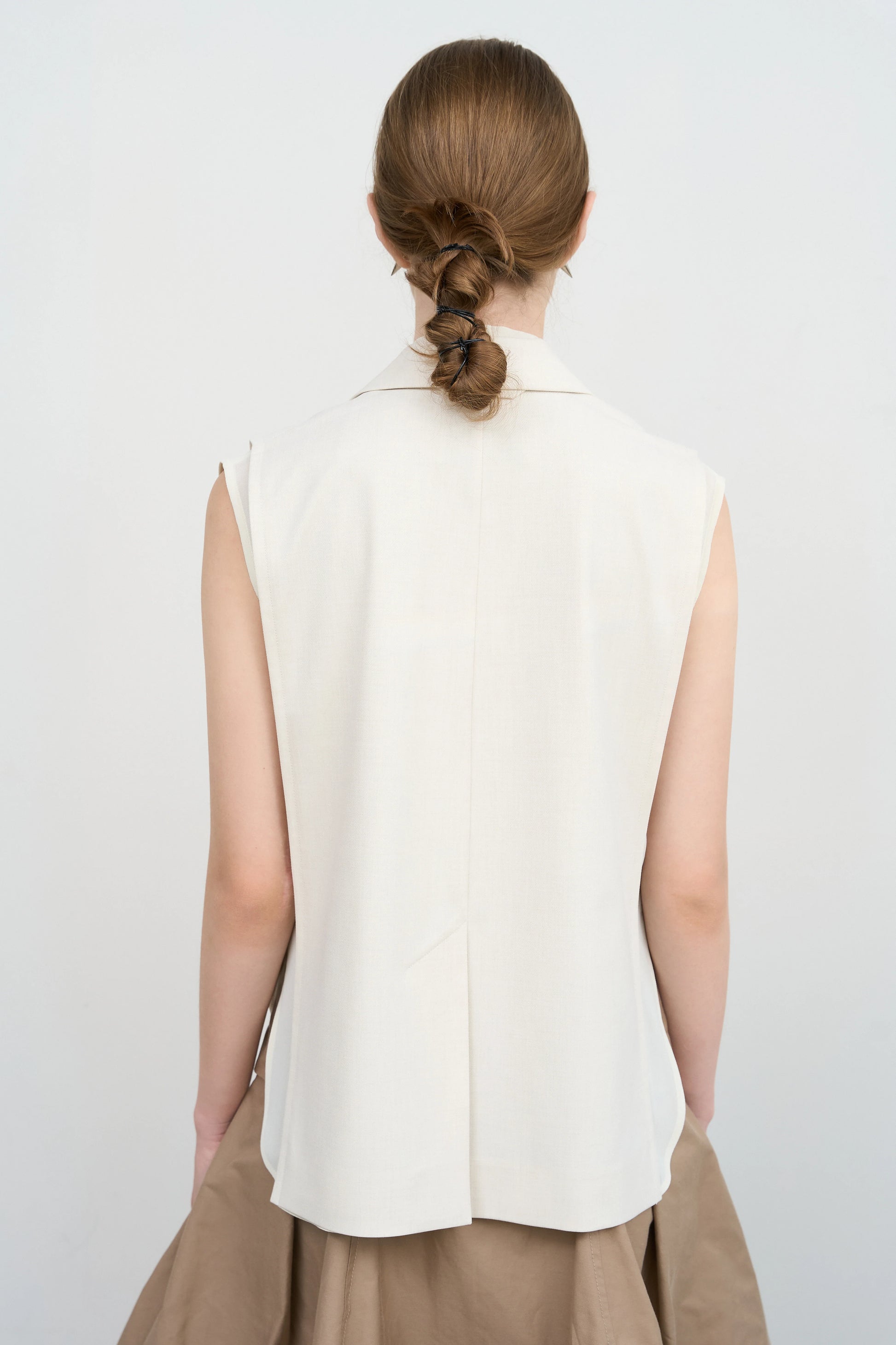 Layered Tucked Hem Vest by Litkovska, contemporary tailored vest with sculptural layered hem, relaxed fit and architectural silhouette.