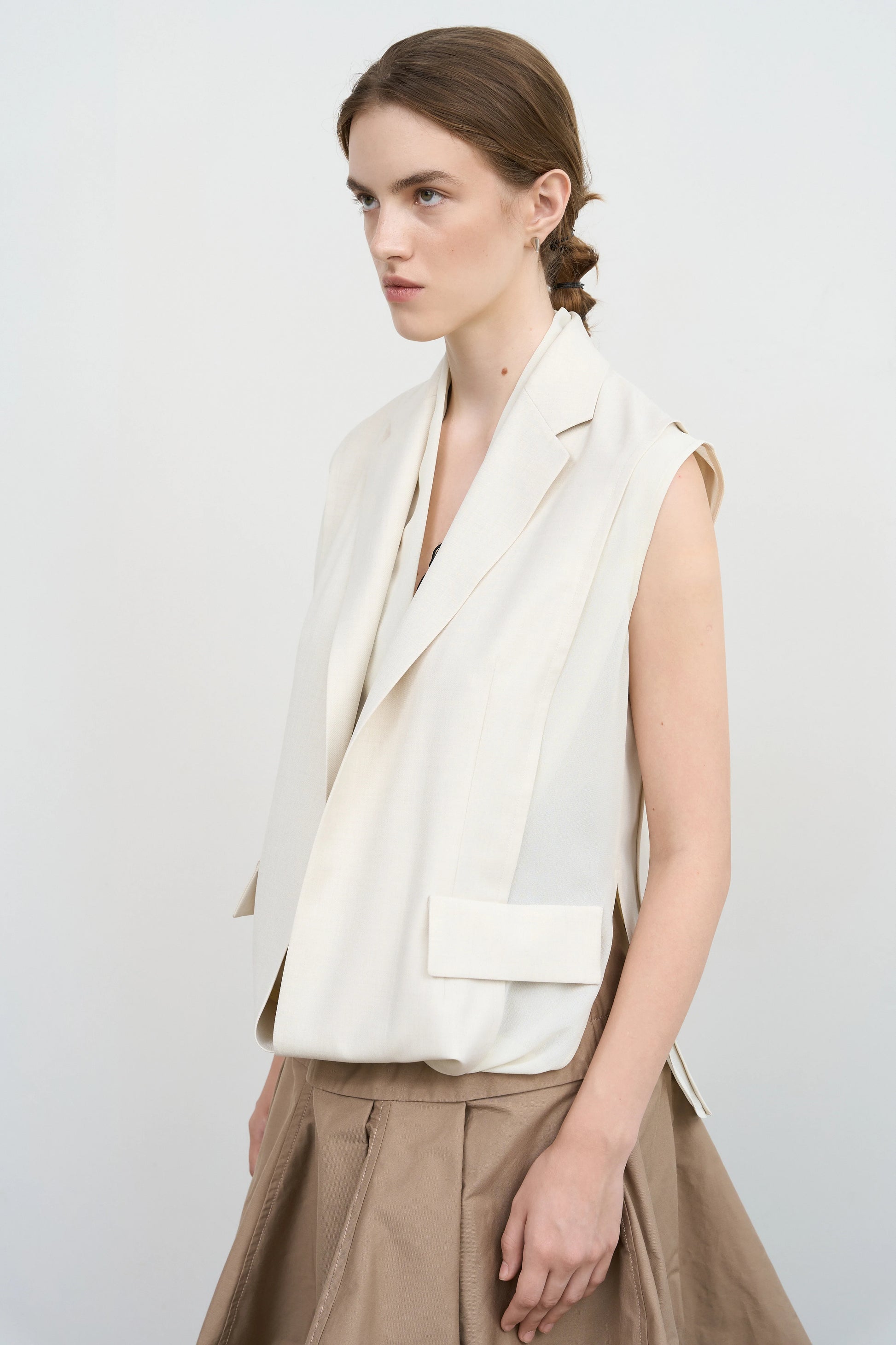 Layered Tucked Hem Vest by Litkovska, contemporary tailored vest with sculptural layered hem, relaxed fit and architectural silhouette.