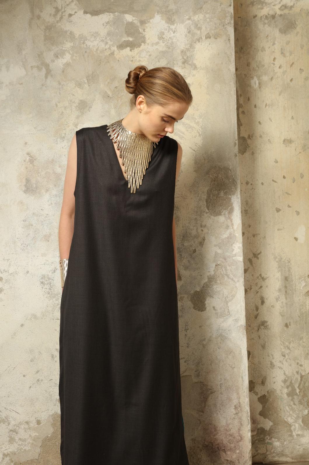 Luminous Gold Necklace by SO-LE STUDIO, handcrafted in Italy from upcycled Ferragamo leather, featuring a sculptural gold-tone design that embodies sustainable luxury and contemporary elegance.