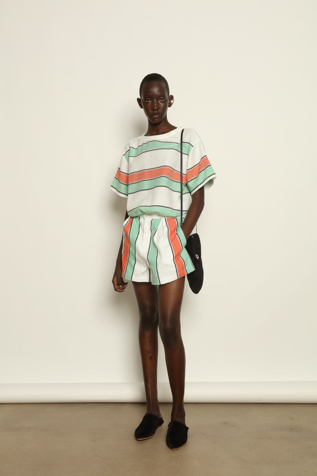 Tennis Dress Stripe 02 by House of Woven Stories, handwoven natural fibre dress with striped pattern, structured silhouette and modern sporty elegance.