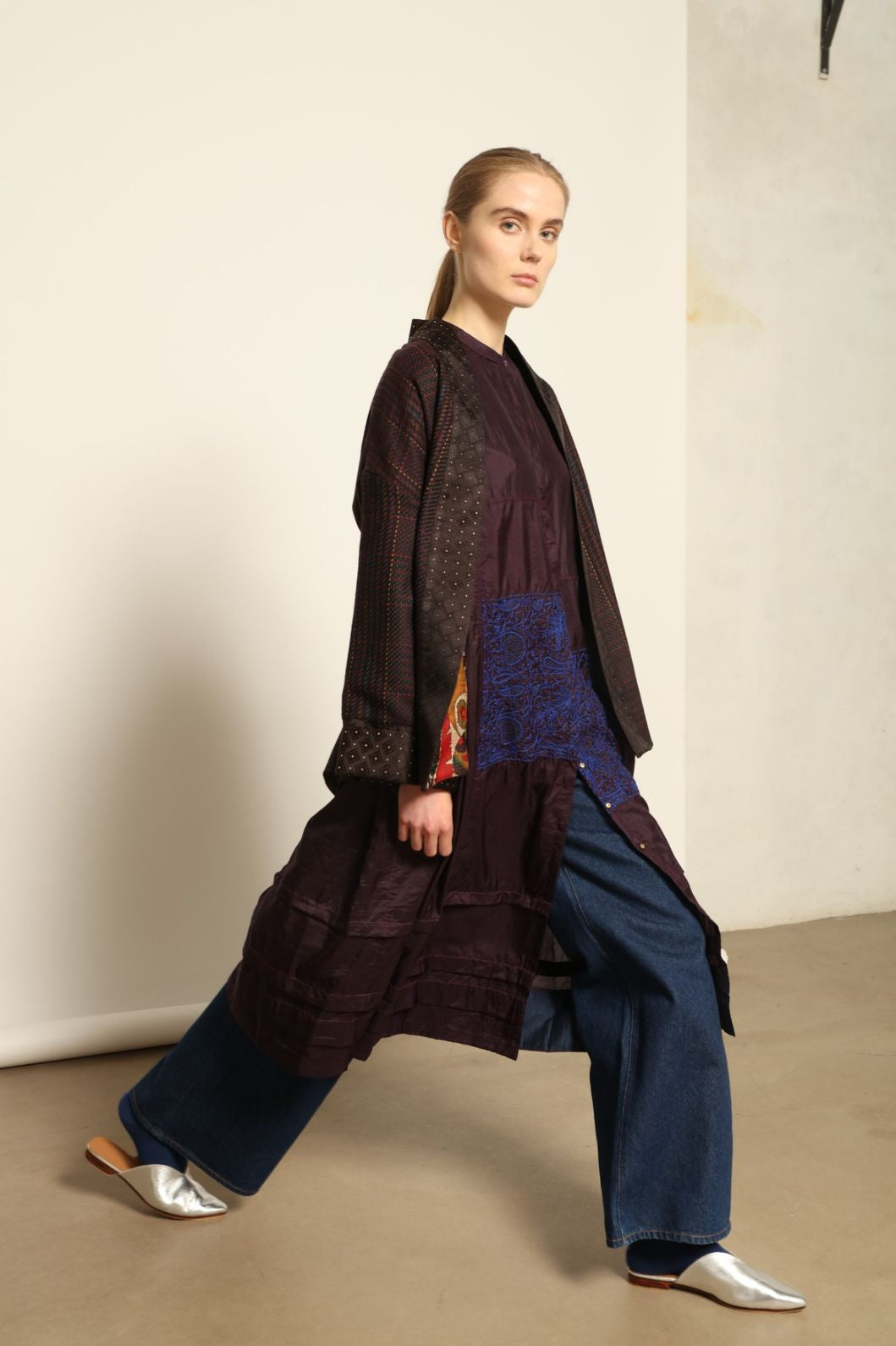 Model is wearing the Miraj 121 Pure Silk Dress by Injiri, handcrafted in maroon silk with detailed navy hand embroidery, showcasing Indian craftsmanship and refined elegance.