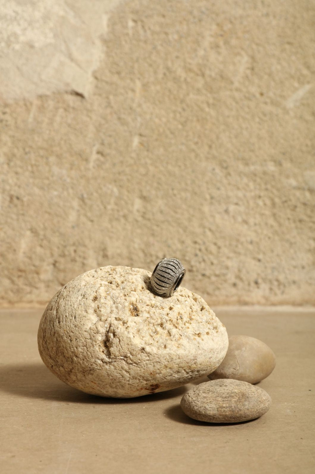 Mono Crystal Silver Earcuff by SO-LE STUDIO, part of the curated selection at House of Woven Stories, handcrafted in Italy from upcycled Ferragamo leather with a silver metallic finish and single crystal accent, expressing minimalist sustainable elegance.