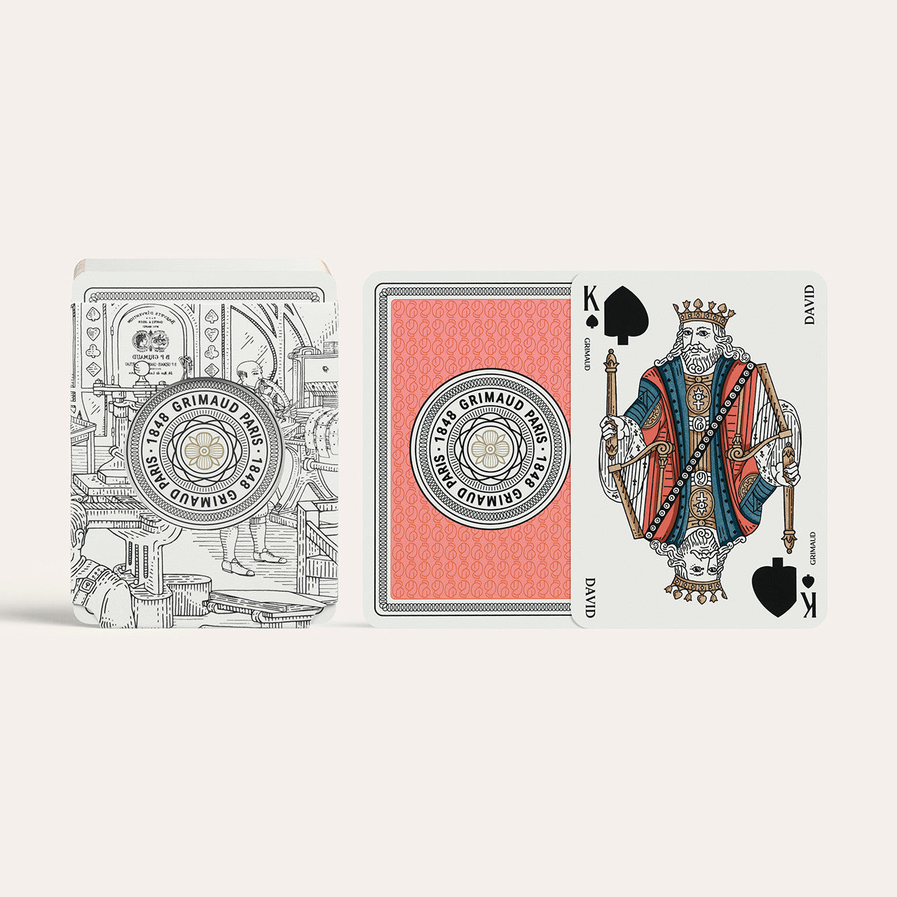 N°200 Cartes à Jouer by Grimaud Paris from the House of Woven Stories selection, luxury Bridge and Poker playing cards in Coral Red, made in France with gold foil detailing and illustrated design.