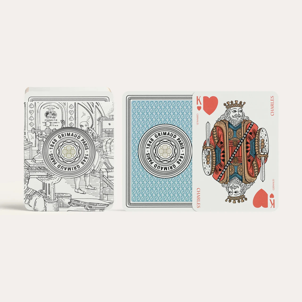 N°200 Cartes à Jouer by Grimaud Paris from the House of Woven Stories selection, luxury Bridge and Poker playing cards in Dolphin Blue, made in France with gold foil detailing and illustrated design.