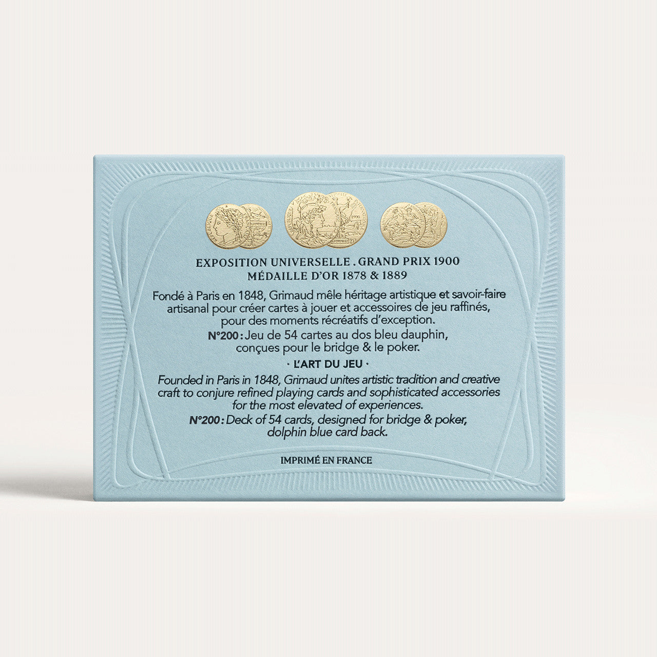 N°200 Cartes à Jouer by Grimaud Paris from the House of Woven Stories selection, luxury Bridge and Poker playing cards in Dolphin Blue, made in France with gold foil detailing and illustrated design.