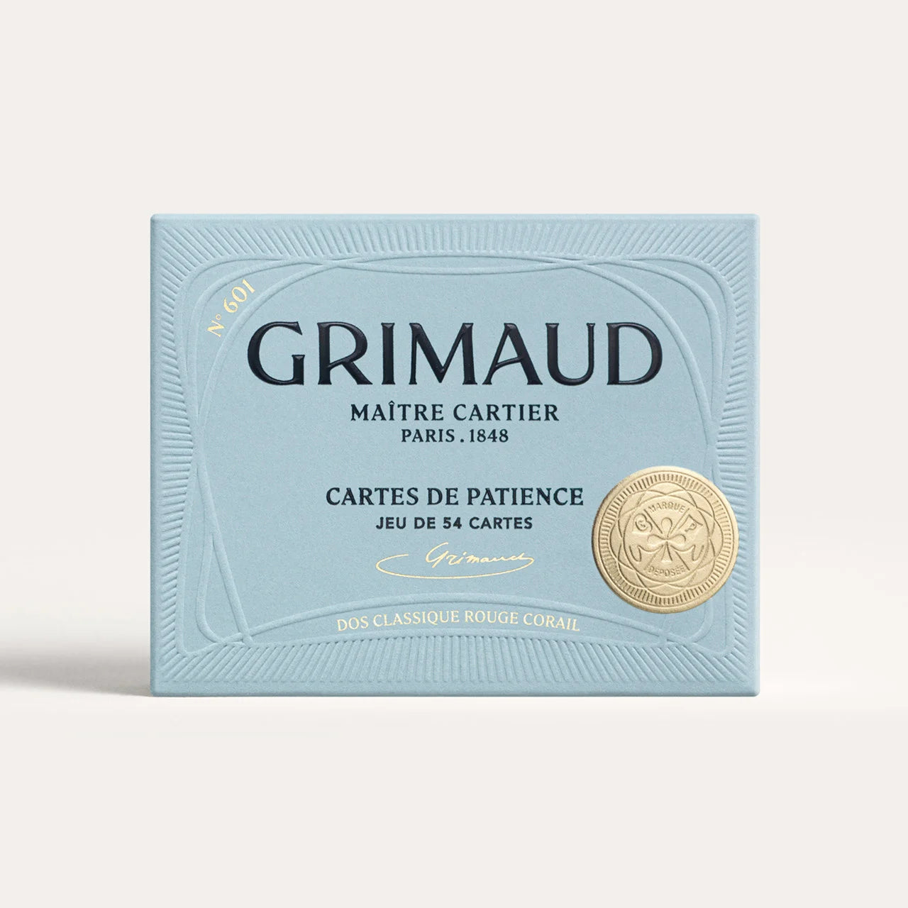 N°600 Cartes de Patience by Grimaud Paris from the House of Woven Stories selection, luxury solitaire playing cards in Coral Red, made in France with gold-gilded corners and illustrated design.