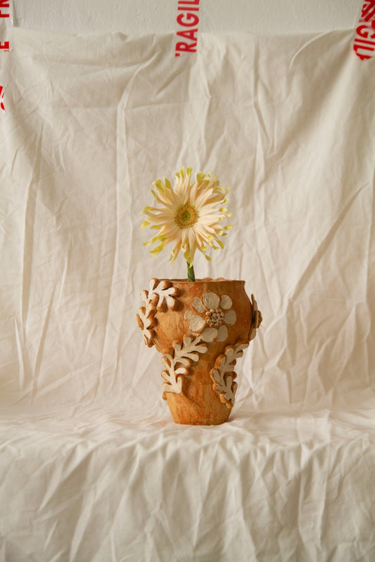 Petit Jardin n.05 by Clandestine Céramique, handmade in warm brown clay with a natural glossy glaze and hand-painted floral motifs, part of the House of Woven Stories selection.