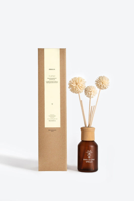 Frigga natural home perfume by Smells Like Spells protects your home and family with warm, evolving notes of tobacco, laurel, and agarwood. Handcrafted, organic, cozy scent for home protection, harmony, and prosperity.