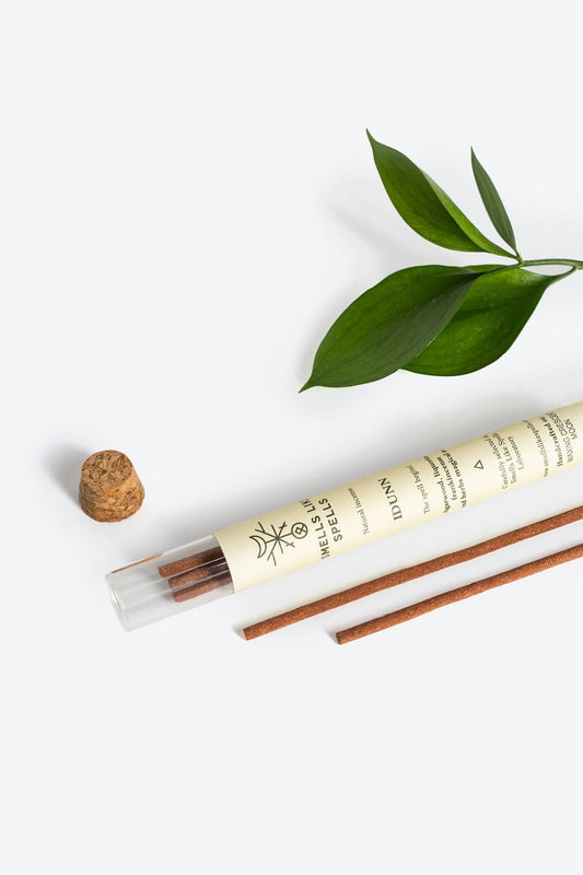 Handcrafted natural incense sticks by Smells Like Spells, with agarwood, licorice, frankincense, and wild herbs. Dedicated to Norse goddess Idunn for youth, vitality, and romance.