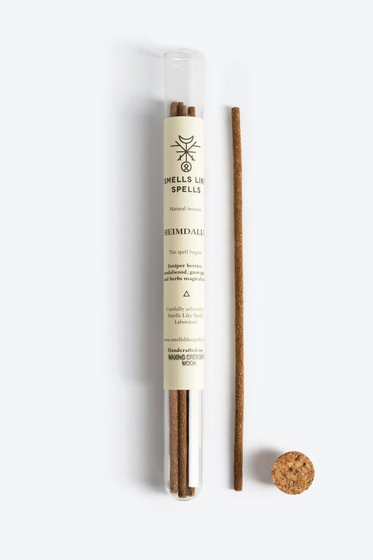 Handmade natural incense sticks with juniper berries, sandalwood, guar gum, and wild herbs, designed for protection and energy cleansing by Smells Like Spells. Pack of five sticks with a calming, earthy aroma.