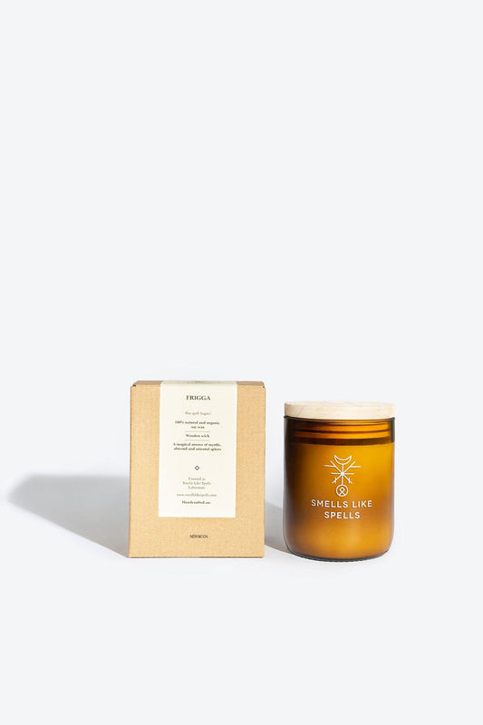 Handmade natural soy-wax aromatic candle by Smells Like Spells with rosemary, lavender, and myrrh scent, designed to cleanse negative energy and bring harmony and protection to the home.