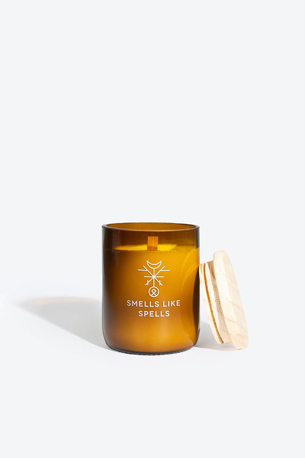 Handmade natural soy-wax aromatic candle by Smells Like Spells with rosemary, lavender, and myrrh scent, designed to cleanse negative energy and bring harmony and protection to the home.