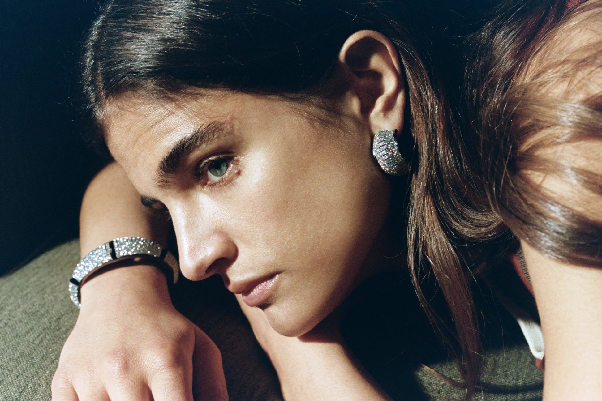 Cosmo Crystal Gold leather earrings by SO-LE STUDIO, handcrafted in Tuscany, softly rounded gold-toned design with crystal accents on the ears