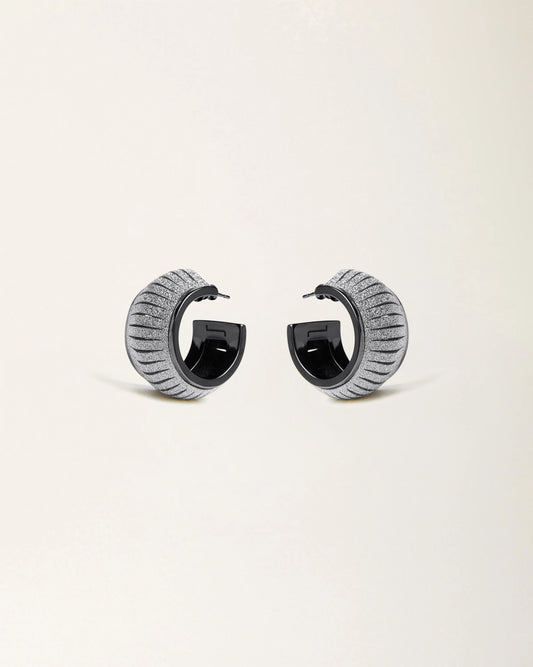 Cosmo Crystal Gold leather earrings by SO-LE STUDIO, handcrafted in Tuscany, softly rounded gold-toned design with crystal accents on the ears