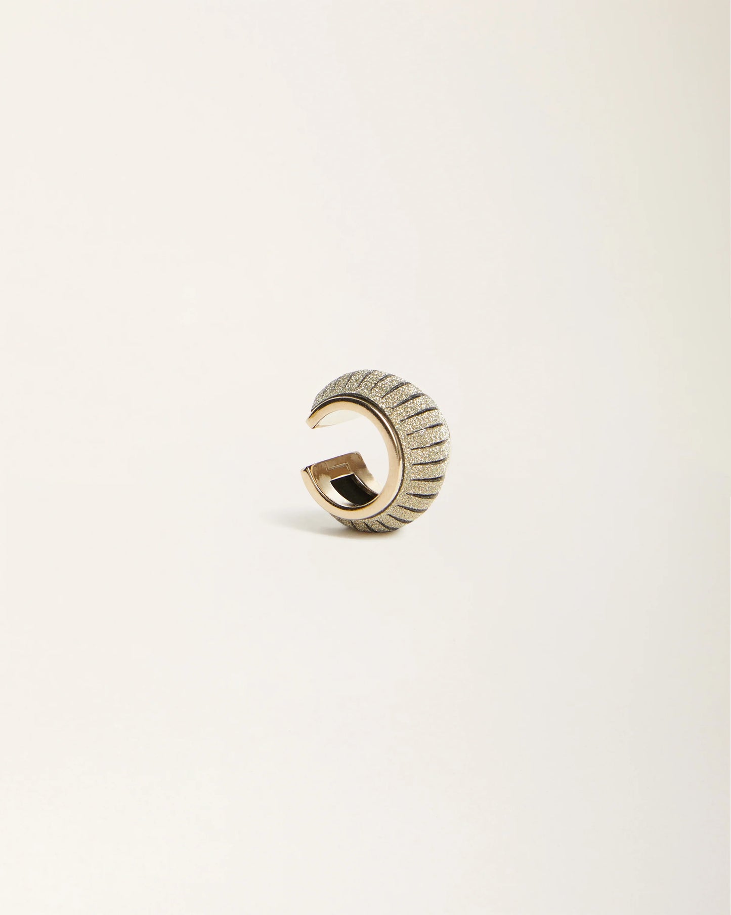 Mono Crystal Gold leather ear cuff by SO-LE STUDIO, handcrafted in Tuscany, minimal gold-toned design with crystal accents, piercing-free and lightweight