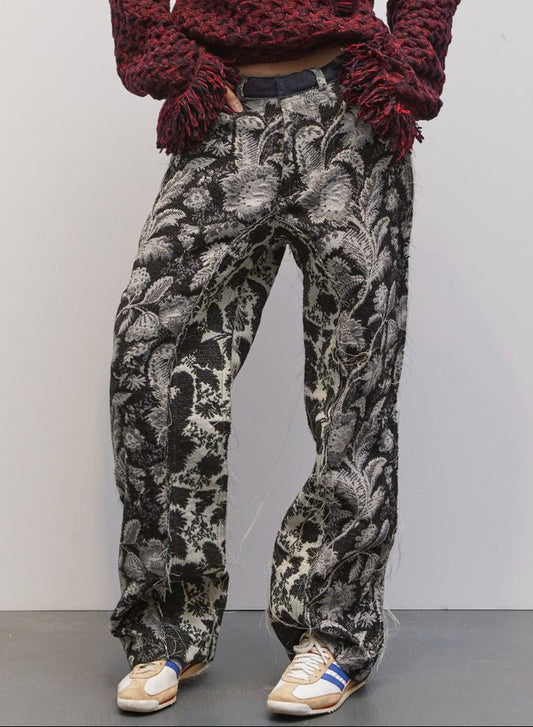 Model wearing the Tom Black Jacquard Pant by Maison Jejia, part of the House of Woven Stories selection, featuring textured black jacquard, sleek tailored silhouette, and relaxed contemporary fit