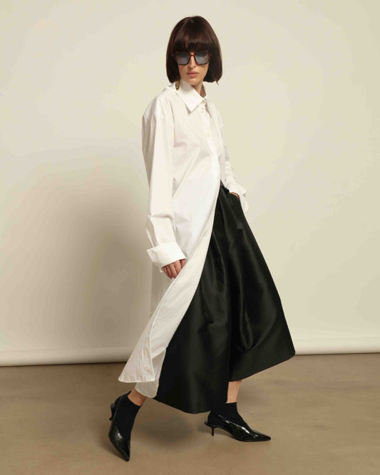 White Oscar Cotton Dress with asymmetric silk panel, crisp cotton fabric, sharp collar, and button-down front by House of Woven Stories.