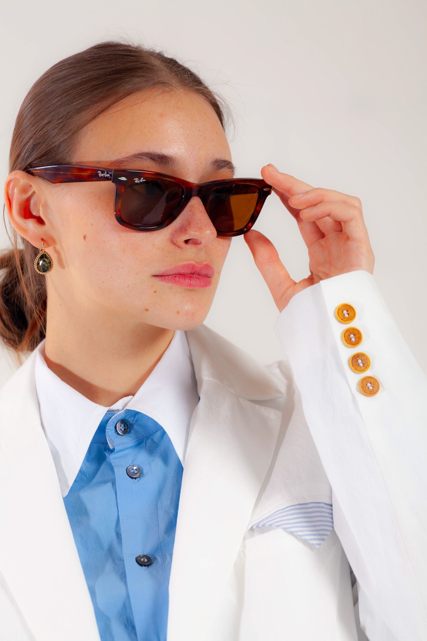 Model is wearing the Will Latte Cotton Blazer by Balia 8.22, featuring a relaxed silhouette, single-breasted front, and chic latte hue for timeless, versatile elegance. Part of House of Woven Stories selection.